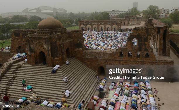 View of Muslims during Eid al-Fitr prayers at the Feroz Shah Kotla Mosque in New Delhi.