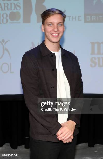 George Ezra poses for a photograph during the presentation of a cheque for £250,000 from the Brit Awards to The Brit School, Mind and Music Support...