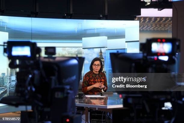 Sri Mulyani Indrawati, Indonesia's finance minister, gestures as she speaks during a Bloomberg Television interview in London, U.K., on Tuesday, June...