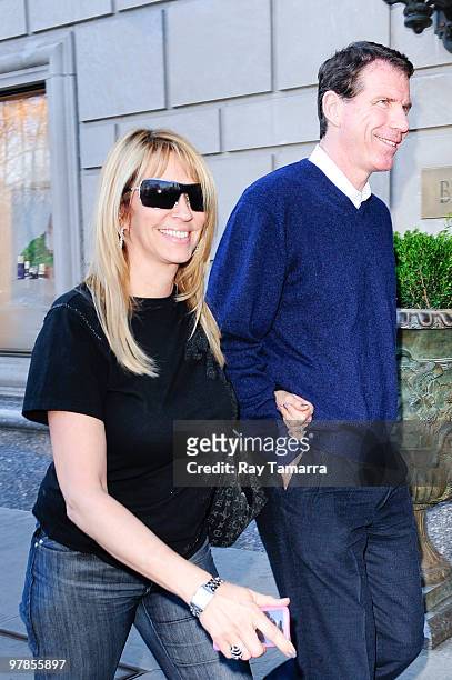 New Jersey Nets General Manager and interim head coach Kiki Vandeweghe and Peggy Vandeweghe walk in Midtown Manhattan hotel on March 18, 2010 in New...