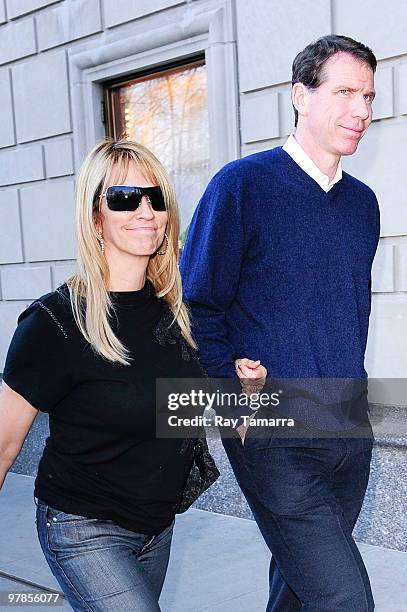 New Jersey Nets General Manager and interim head coach Kiki Vandeweghe and Peggy Vandeweghe walk in Midtown Manhattan hotel on March 18, 2010 in New...