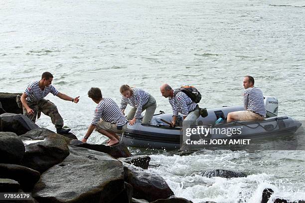 Scientists of the Terre-Ocean mission accost, on February 13 on the Devil's Island in the Caribbean Sea off French Guiana, about 10 miles from...