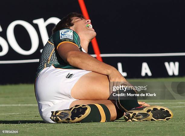 Steven Hunt of South Africa lies on the field after getting injured during day one of the IRB Adelaide International Rugby Sevens match between South...