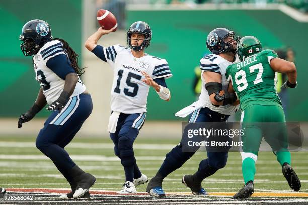 Ricky Ray of the Toronto Argonauts throws from the pocket in the game between the Toronto Argonauts and Saskatchewan Roughriders at Mosaic Stadium on...