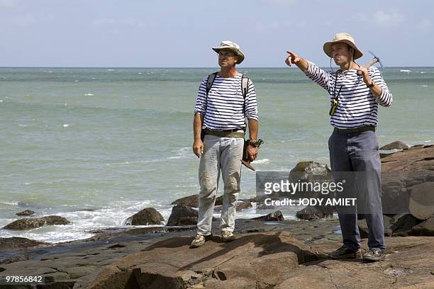 French geologist Eric Gilli poses as he examines rocks to find trail of a possible tsunami in 1855 in the Iles du Salut in French Guiana, about 10...