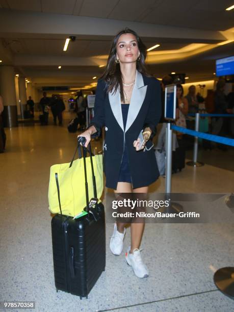 Emily Ratajkowski is seen at Los Angeles International Airport on June 18, 2018 in Los Angeles, California.