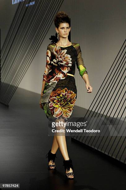 Model showcases designs on the catwalk by Easton Pearson as part of the L'Oreal Paris Runway 7 collections on the fifth day of the 2010 L'Oreal...