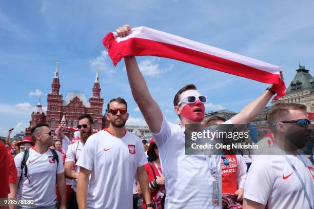 Fans of Poland celebrate before the 2018 FIFA World Cup Russia group H match between Poland and Senegal at Red Square on June 19, 2018 in Moscow,...
