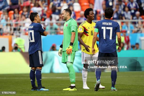 Carlos Sanchez of Colombia reacts as he is sent off as David Ospina of Colombia and Shinji Kagawa of Japan speak during the 2018 FIFA World Cup...