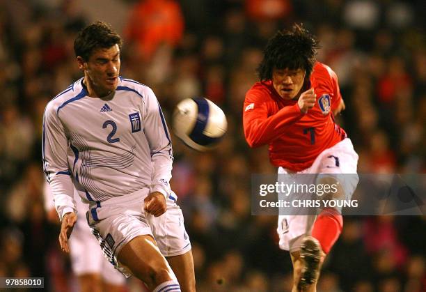 South Korea's Park Ji Sung vies with Greece's Georgios Seitaridis during their friendly International football match at Cravern Cottage in London, 06...