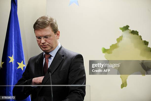 Enlargement Commissioner Stefan Fuele prepares to speak during a joint press conference with Kosovo's President Fatmir Sejdiu in Pristina on March...