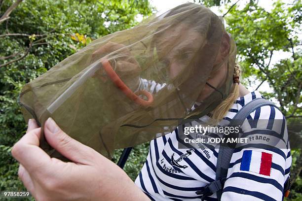 Scientists of the Terre-Ocean mission, Adeline Soulier-Perkins collects insects, on the Royal Island, the largest of the Islands of Salvation in the...