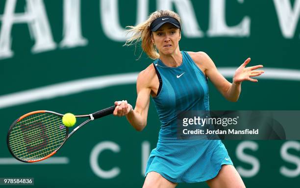 Elina Svitolina of Slovakia plays a forehand during her first round match against Donna Vekic of Croatia on Day Four of the Nature Valley Classic at...