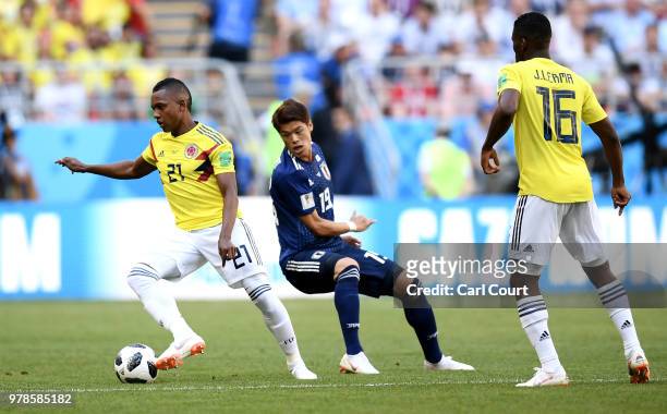 Jose Izquierdo of Colombia and Hiroki Sakai of Japan in action during the 2018 FIFA World Cup Russia group H match between Colombia and Japan at...