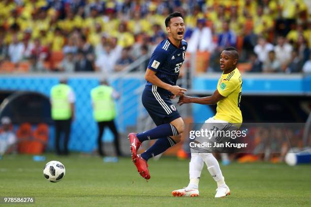 Maya Yoshida of Japan is fouled by Jose Izquierdo of Colombia during the 2018 FIFA World Cup Russia group H match between Colombia and Japan at...