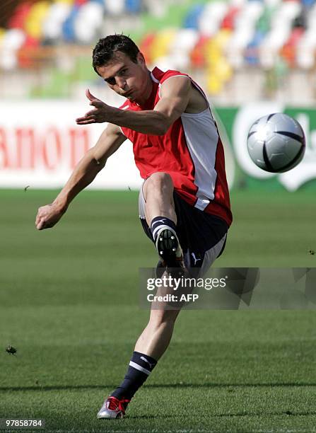 Swiss forward Alex Frei shoots a goal during a training session at the Dr Magalhaes Pessoa stadium in Leiria 12 June 2004 on the eve of the European...