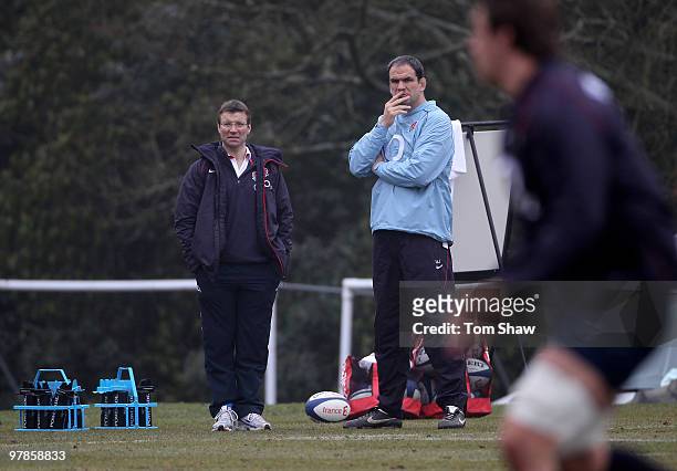 Rob Andrew the Director of Elite Rugby and Martin Johnson the England team Manager look on during the England training session at Pennyhill Park on...