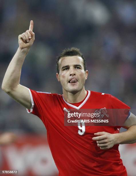 Switzerland's Alexander Frei celebrates after scoring against Greece during their World Cup 2010 Europe group 2 qualification football match at the...