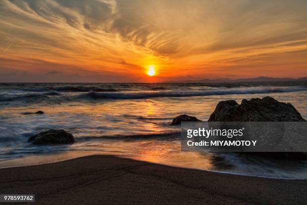 seaside sunset - miyamoto y stock pictures, royalty-free photos & images