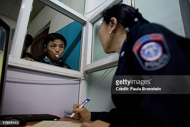 Mongolian street children get registered at a child detention center March 11, 2010 in Ulaan Baatar, Mongolia. The police picked up a dozen boys to...