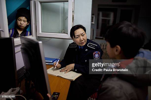 Mongolian street children get registered at a child detention center March 11, 2010 in Ulaan Baatar, Mongolia. The police picked up a dozen boys to...