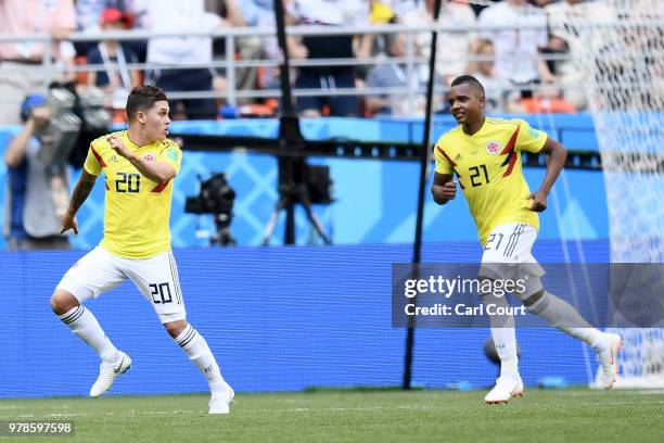 Juan Quintero of Colombia celebrates with teammate Jose Izquierdo after scoring his team's first goal during the 2018 FIFA World Cup Russia group H...