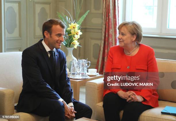 German Chancellor Angela Merkel and French President Emmanuel Macron hold bilateral talks on June 19 at the Meseberg Palace, north of Berlin, during...