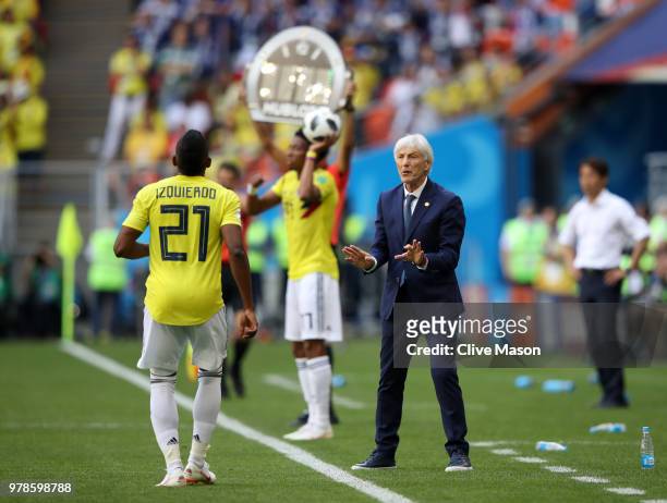 Jose Pekerman, Head coach of Colombia gives Jose Izquierdo instructions during the 2018 FIFA World Cup Russia group H match between Colombia and...