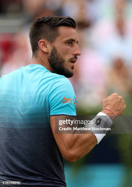 Damir Dzumhur of Bosnia celebrates winning a point during his match against Grigor Dimitrov of Bulgaria on Day Two of the Fever-Tree Championships at...