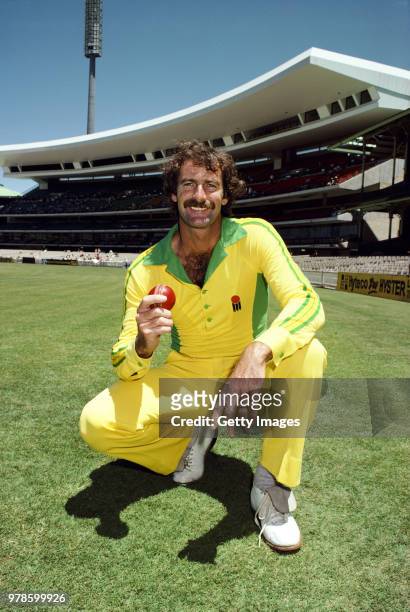 Australia fast bowler Dennis Lillee pictured holding a red ball before a Benson and Hedges World Series One Day International in January 1982 in...