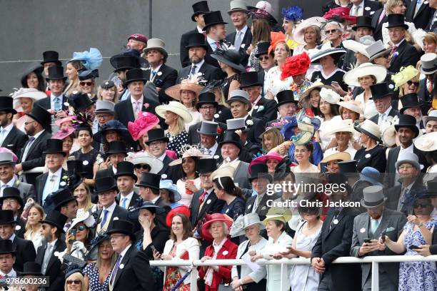 Racegoers wear fashionable hats as crowds gather during Royal Ascot Day 1 at Ascot Racecourse on June 19, 2018 in Ascot, United Kingdom.