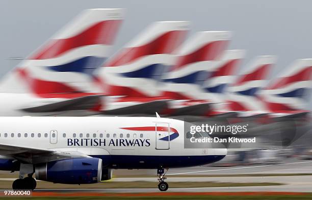 British Airways plane lands at Heathrow Airport on March 19, 2010 in London, England. The planned three day strike by BA cabin crew this weekend will...