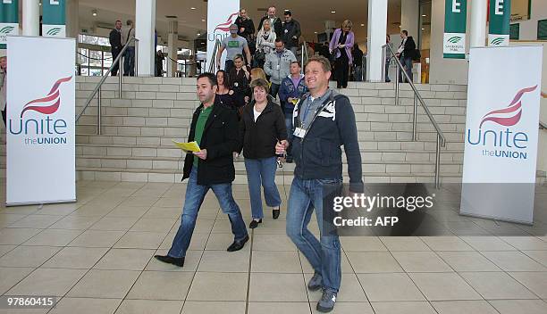 British Airways cabin crew leave Sandown Park racecourse in Surrey, southern England, after a Unite Union mass meeting, on March 19, 2010. Talks...