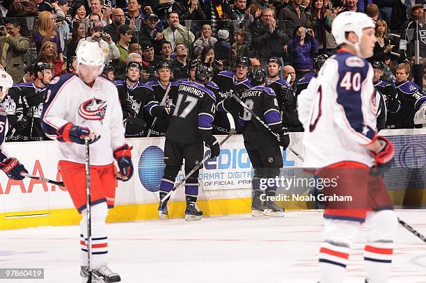 Wayne Simmonds and Drew Doughty of the Los Angeles Kings celebrate with the bench against the Columbus Blue Jackets on March 8, 2010 at Staples...