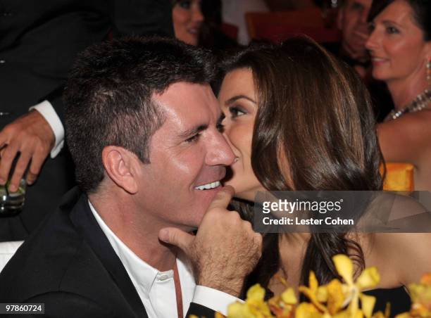 Simon Cowell and makeup artist Mezhgan Hussainy attend the 18th Annual Elton John AIDS Foundation Oscar party held at Pacific Design Center on March...