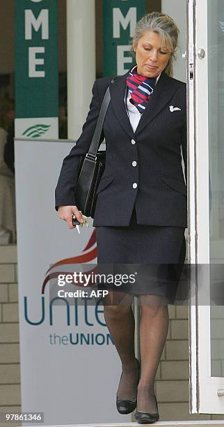British Airways cabin crew members leave Sandown Park racecourse in Surrey, southern England, after a Unite Union mass meeting of BA cabin crew was...