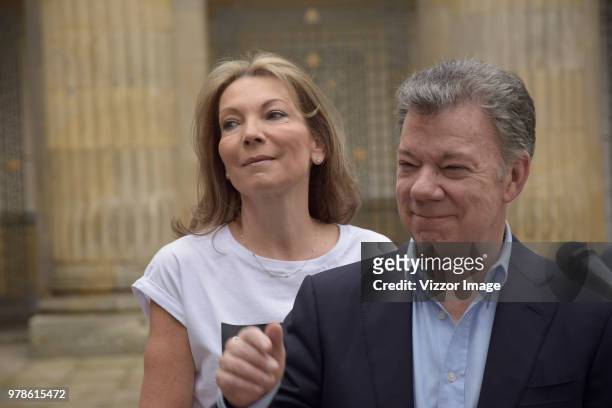 President Juan Manuel Santos casts his vote with his wife Clemencia during the presidential ballotage between Conservative Ivan Duque and leftist...