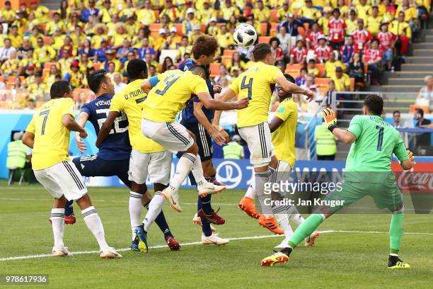 Yuya Osako of Japan heads the gall past David Ospina of Colombia to score his team's second goal during the 2018 FIFA World Cup Russia group H match...