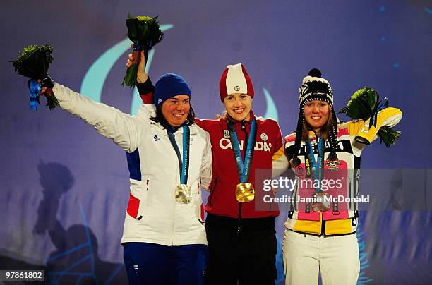 Silver medalist Solene Jambaque of France, gold medalist Lauren Woolstencroft of Canada and Andrea Rothfuss of Germany celebrate during the medal...