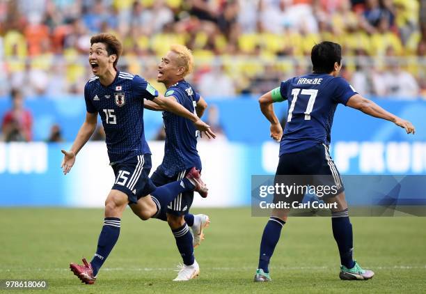 Yuya Osako of Japan celebrates after scoring his team's second goal during the 2018 FIFA World Cup Russia group H match between Colombia and Japan at...