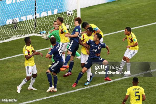 Yuya Osako of Japan heads the gall past David Ospina of Colombia to score his team's second goal during the 2018 FIFA World Cup Russia group H match...