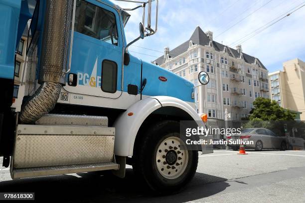 Pacific Gas and Electric truck sits parked on a street on June 18, 2018 in San Francisco, California. California lawmakers are saying that PG&E is...
