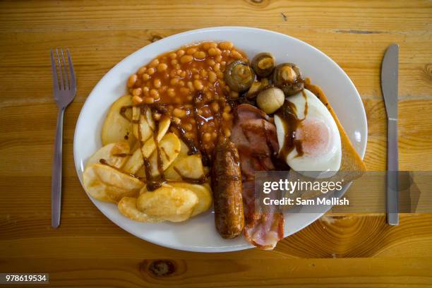 Full English breakfast with brown sauce at Smokey Joes transport cafe on 05th June 2008 in Blackwater in the United Kingdom. Smokey Joes is a...