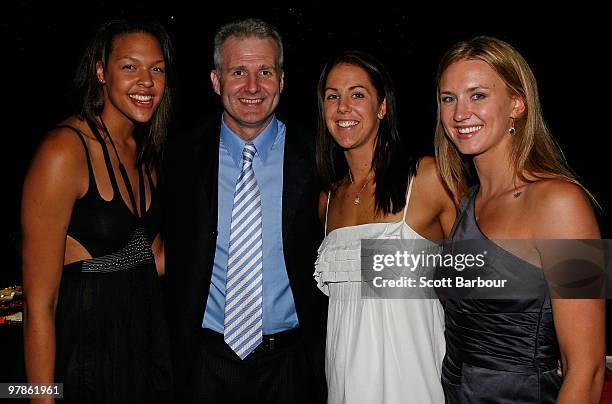 Liz Cambage, Andrew Gaze, Jenna O'Hea and Hanna Zavecz pose for a photograph as they attend the 2009/10 NBL Awards Night at Crown Casino on March 19,...