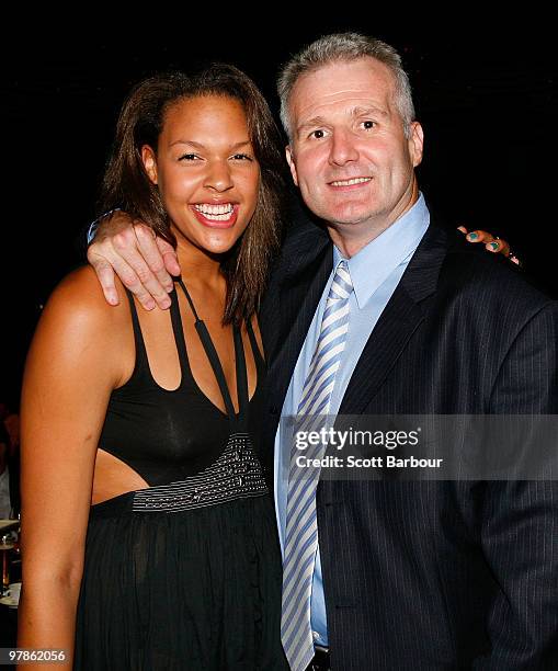 Liz Cambage and Andrew Gaze pose for a photograph as they attend the 2009/10 NBL Awards Night at Crown Casino on March 19, 2010 in Melbourne,...