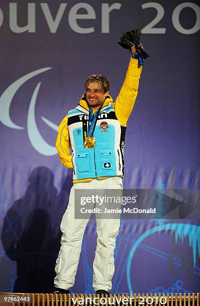 Gold medalist Gerd Schonfelder of Germany celebrates during the medal ceremony for the Men's Standing Downhill on Day 7 of the 2010 Vancouver Winter...