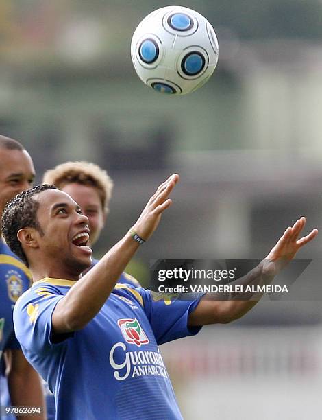 Brazilian national football team player Robinho controls the ball during a training session on March 25 in Teresopolis, Brazil. Brazil will face...