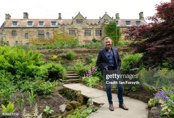 Garden designer Chris Beardshaw poses for pictures during a media event for the launch of the new arts and crafts style garden he has designed for...