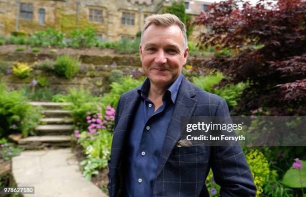 Garden designer Chris Beardshaw poses for pictures during a media event for the launch of the new arts and crafts style garden he has designed for...