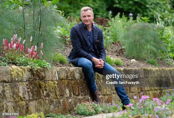 Garden designer Chris Beardshaw poses for pictures during a media event for the launch of the new arts and crafts style garden he has designed for...